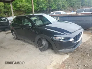 2021 Mazda CX-30 Premium with VIN 3MVDMADL1MM319019, listed as a Copart auction lot 54258605 with 35,538 mi miles and Salvage title. Bid and sale history available at DreamBid. Image 4.