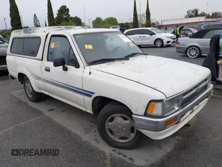 1994 Toyota Pickup DX with VIN JT4RN81P6R5194438, listed as a IAAI auction lot 41795510 with Not Provided miles and . Bid and sale history available at DreamBid. Image 1.