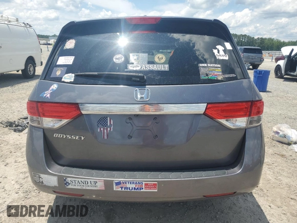 2014 Honda Odyssey EX-L with VIN 5FNRL5H62EB112280, listed as a Copart auction lot 60138645 with 167,657 mi miles and Salvage title. Bid and sale history available at DreamBid. Image 6.