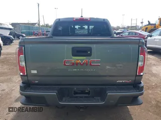 2022 GMC Canyon 4WD AT4 z VIN 1GTG6FEN2N1101756, wystawiony jako IAAI lot #42107148 z przebiegiem 37 900 mil mil oraz . Historia ofert i sprzedaży dostępna na DreamBid. Obrazek 17.