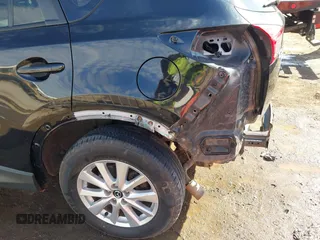 2014 Mazda CX-5 Sport with VIN JM3KE4BE6E0388909, listed as a IAAI auction lot 41876514 with 196,882 mi miles. Bid and sale history available at carsss.com. Image 6.