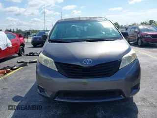 2012 Toyota Sienna with VIN 5TDZK3DC8CS190719, listed as a IAAI auction lot 41983695 with 68,377 mi miles and . Bid and sale history available at DreamBid. Image 13.