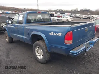 2003 Dodge Dakota Sport with VIN 1D7HG32NX3S322085, listed as a IAAI auction lot 41780125 with 95,321 mi miles. Bid and sale history available at carsss.com. Image 3.