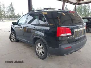 2011 Kia Sorento LX with VIN 5XYKTDA24BG170561, listed as a IAAI auction lot 42011756 with 211,833 mi miles. Bid and sale history available at carsss.com. Image 3.
