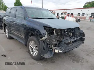 2014 Lexus GX 460 with VIN JTJBM7FX0E5069997, listed as a IAAI auction lot 42076860 with 122,800 mi miles. Bid and sale history available at carsss.com. Image 1.