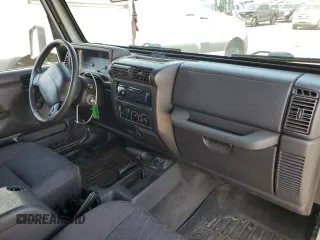 2002 Jeep Wrangler X with VIN 1J4FA39S32P708163, listed as a Copart auction lot 69703254 with 119,843 mi miles and Salvage Title. Bid and sale history available at carsss.com. Image 8.