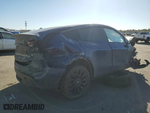 2022 Tesla Model Y Performance with VIN 7SAYGDEF8NF375858, listed as a Copart auction lot 46127965 with Not Provided miles and Salvage Title. Bid and sale history available at DreamBid. Image 3.