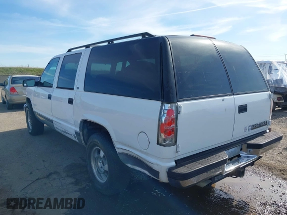 1997 Chevrolet Suburban with VIN 3GNFK16R4VG126095, listed as a IAAI auction lot 41548470 with 290,502 mi miles. Bid and sale history available at carsss.com. Image 3.