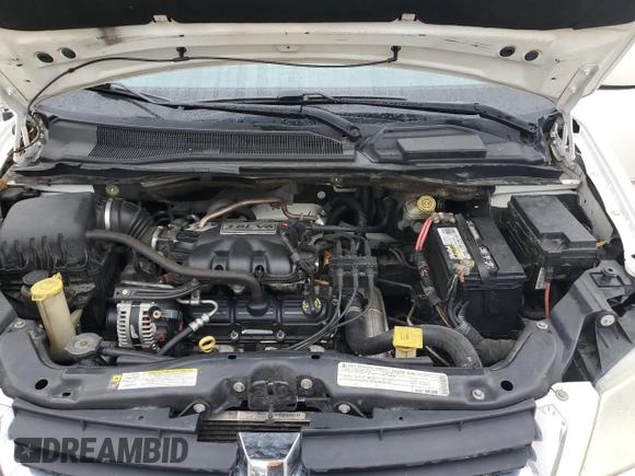 2010 Dodge Grand Caravan SXT with VIN 2D4RN5D12AR244722, listed as a Copart auction lot 43725005 with 210,546 mi miles and Clean Title. Bid and sale history available at DreamBid. Image 12.