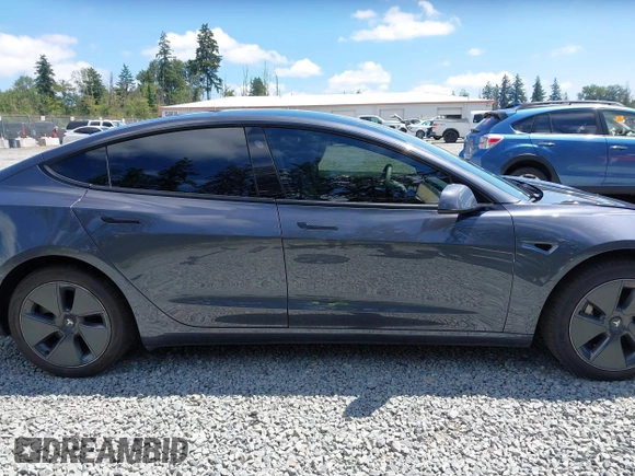 2023 Tesla Model 3 z VIN 5YJ3E1EA6PF650212, wystawiony jako IAAI lot #42554747 z przebiegiem 49 838 mil mil oraz . Historia ofert i sprzedaży dostępna na DreamBid. Obrazek 14.