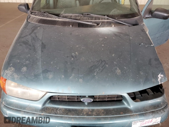 1998 Ford Windstar GL z VIN 2FMZA51U5WBC57452, wystawiony jako Copart lot #86218814 z przebiegiem 128 014 mil mil oraz Szkoda całkowita • Salvage title. Historia ofert i sprzedaży dostępna na DreamBid. Obrazek 12.