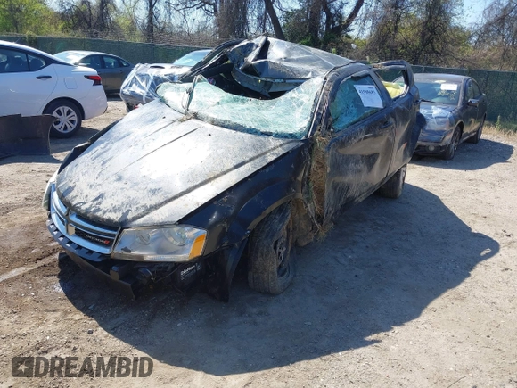 2013 Dodge Avenger SE with VIN 1C3CDZAB7DN580897, listed as a IAAI auction lot 41988683 with Not Provided miles and . Bid and sale history available at carsss.com. Image 2.
