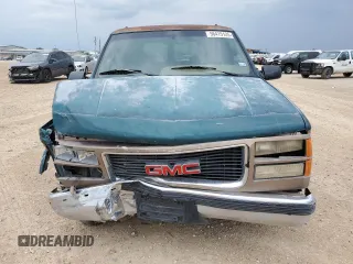 1995 GMC Suburban z VIN 1GKEC16K9SJ708907, wystawiony jako Copart lot #56415125 z przebiegiem 251 343 mil mil oraz Szkoda całkowita • Salvage title. Historia ofert i sprzedaży dostępna na DreamBid. Obrazek 5.