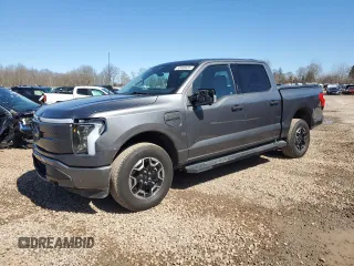 2023 Ford F-150 Lightning Pro with VIN 1FTVW1EL8PWG10894, listed as a Copart auction lot 50988655 with 34,020 mi miles and Salvage Title. Bid and sale history available at carsss.com. Image 1.