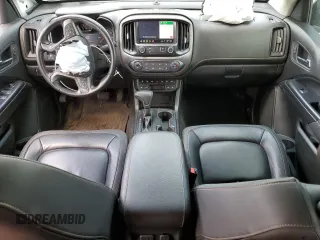 2021 GMC Canyon 4WD AT4 z VIN 1GTG6FEN9M1147406, wystawiony jako Copart lot #55454634 z przebiegiem 82 898 mil mil oraz Szkody całkowita. Historia ofert i sprzedaży dostępna na DreamBid. Obrazek 8.