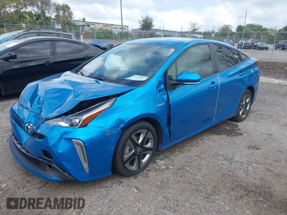 2022 Toyota Prius L Eco with VIN JTDKAMFU5N3165006, listed as a IAAI auction lot 41753470 with 33,567 mi miles and . Bid and sale history available at DreamBid. Image 2.