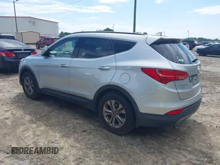 2016 Hyundai Santa Fe z VIN 5XYZU3LB3GG341634, wystawiony jako IAAI lot #42690921 z przebiegiem 149 571 mil mil oraz . Historia ofert i sprzedaży dostępna na DreamBid. Obrazek 3.