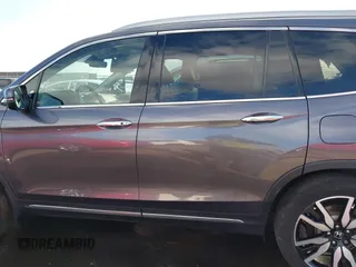 2019 Honda Pilot Touring 7-Passenger z VIN 5FNYF5H65KB020420, wystawiony jako IAAI lot #41575972 z przebiegiem 48 950 mil mil oraz . Historia ofert i sprzedaży dostępna na DreamBid. Obrazek 14.