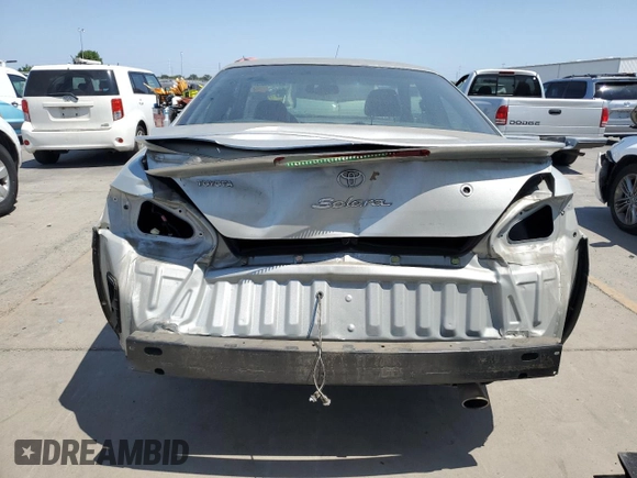 2002 Toyota Solara SE z VIN 2T1CF28P62C575561, wystawiony jako Copart lot #59748025 z przebiegiem 108 748 mil mil oraz Szkoda całkowita • Salvage title. Historia ofert i sprzedaży dostępna na DreamBid. Obrazek 6.