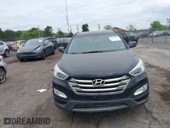 2014 Hyundai Santa Fe z VIN 5XYZUDLB8EG196450, wystawiony jako IAAI lot #42112914 z przebiegiem 91 710 mil mil oraz . Historia ofert i sprzedaży dostępna na DreamBid. Obrazek 6.