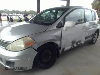 2009 Nissan Versa 1.8 SL with VIN 3N1BC13EX9L362594, listed as a IAAI auction lot 37762793 with 254,167 mi miles. Bid and sale history available at carsss.com. Image 6.