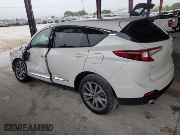 2021 Acura RDX Technology with VIN 5J8TC1H50ML023309, listed as a Copart auction lot 59210935 with 14,144 mi miles and Salvage title. Bid and sale history available at DreamBid. Image 2.