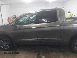 2020 Honda Ridgeline RTL-E with VIN 5FPYK3F75LB001516, listed as a IAAI auction lot 41605859 with 93,902 mi miles and . Bid and sale history available at DreamBid. Image 14.