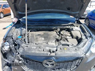 2014 Mazda CX-5 Grand Touring with VIN JM3KE2DY8E0383206, listed as a IAAI auction lot 40205756 with 120,231 mi miles. Bid and sale history available at carsss.com. Image 10.
