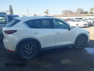 2017 Mazda CX-5 Grand Touring with VIN JM3KFBDL6H0164993, listed as a IAAI auction lot 41450556 with 97,733 mi miles. Bid and sale history available at carsss.com. Image 13.