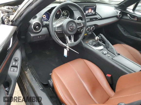 2022 Mazda MX-5 Miata Grand Touring z VIN JM1NDAM77N0501546, wystawiony jako Copart lot #82161264 z przebiegiem 12 245 mil mil oraz Szkoda całkowita • Salvage title. Historia ofert i sprzedaży dostępna na DreamBid. Obrazek 8.