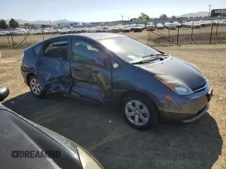 2007 Toyota Prius z VIN JTDKB20U573288978, wystawiony jako Copart lot #57469155 z przebiegiem 170 422 mil mil oraz Szkoda całkowita • Salvage title. Historia ofert i sprzedaży dostępna na DreamBid. Obrazek 4.