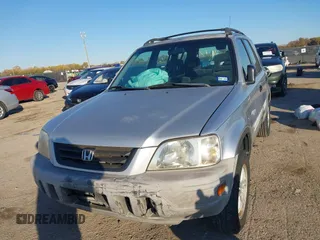 1999 Honda CR-V LX with VIN JHLRD284XXC019021, listed as a IAAI auction lot 41031098 with 204,206 mi miles. Bid and sale history available at carsss.com. Image 17.