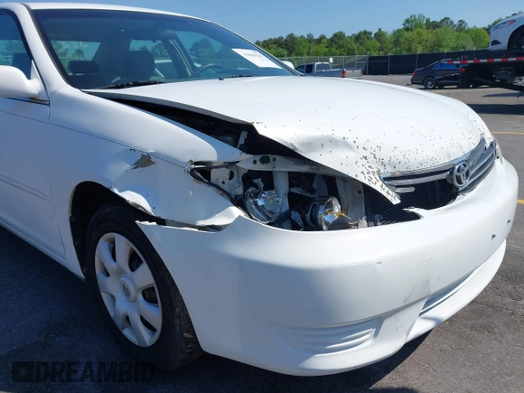 2006 Toyota Camry STD with VIN 4T1BE32KX6U734944, listed as a IAAI auction lot 42006245 with 243,967 mi miles. Bid and sale history available at carsss.com. Image 12.