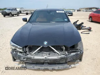 2021 BMW 3 Series 330i с VIN 3MW5R1J01M8B98838, выставлен на аукционе Copart как лот 56878795 с пробегом 62 607 миль миль и Списание • Salvage title. История ставок и продаж доступна на DreamBid. Изображение 5.