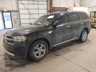 2013 Dodge Durango Crew z VIN 1C4RDJDG7DC661411, wystawiony jako IAAI lot #41617514 z przebiegiem 145 309 mil mil oraz . Historia ofert i sprzedaży dostępna na DreamBid. Obrazek 17.