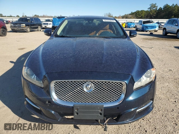 2013 Jaguar XJ with VIN SAJWA2G16DLV50973, listed as a Copart auction lot 82555074 with 148,956 mi miles and Salvage Title. Bid and sale history available at carsss.com. Image 5.