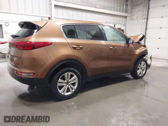 2018 Kia Sportage LX with VIN KNDPMCAC9J7403108, listed as a IAAI auction lot 41946497 with 123,023 mi miles. Bid and sale history available at carsss.com. Image 4.