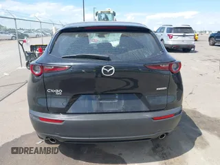 2021 Mazda CX-30 S with VIN 3MVDMBAL0MM254030, listed as a IAAI auction lot 42261180 with 72,459 mi miles and . Bid and sale history available at DreamBid. Image 16.