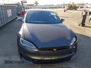 2021 Tesla Model S Long Range with VIN 5YJSA1E53MF436865, listed as a IAAI auction lot 41384837 with 20,829 mi miles and . Bid and sale history available at DreamBid. Image 11.