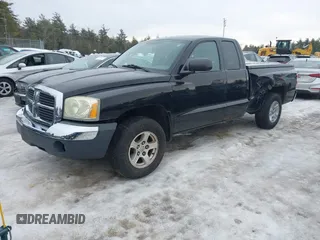 2005 Dodge Dakota SLT with VIN 1D7HE42K75S140168, listed as a IAAI auction lot 41581634 with 121,983 mi miles and . Bid and sale history available at carsss.com. Image 2.