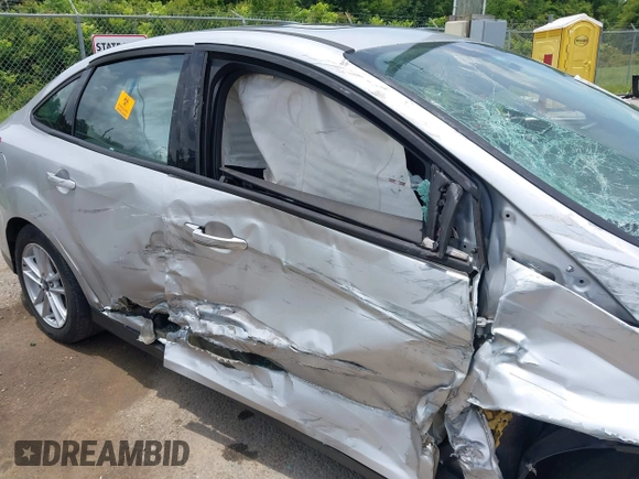 2016 Ford Focus SE with VIN 1FADP3F26GL351775, listed as a IAAI auction lot 42424733 with 164,886 mi miles and . Bid and sale history available at DreamBid. Image 6.