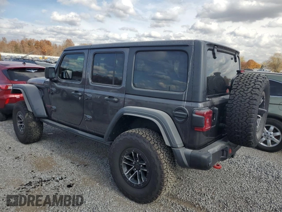 2024 Jeep Wrangler Rubicon X with VIN 1C4RJXFG2RW153197, listed as a Copart auction lot 76521384 with 3,897 mi miles and Salvage title. Bid and sale history available at DreamBid. Image 2.