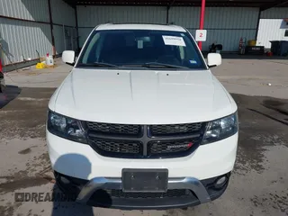 2016 Dodge Journey Crossroad Plus z VIN 3C4PDCGB1GT123668, wystawiony jako IAAI lot #41699950 z przebiegiem 91 410 mil mil oraz . Historia ofert i sprzedaży dostępna na DreamBid. Obrazek 12.