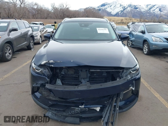 2022 Mazda CX-9 Touring Plus with VIN JM3TCBAY6N0616918, listed as a IAAI auction lot 41242341 with 22,384 mi miles and . Bid and sale history available at carsss.com. Image 12.