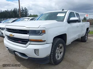 2017 Chevrolet Silverado 1500 LT with VIN 1GCVKREC7HZ131196, listed as a IAAI auction lot 42072336 with 158,140 mi miles. Bid and sale history available at carsss.com. Image 6.