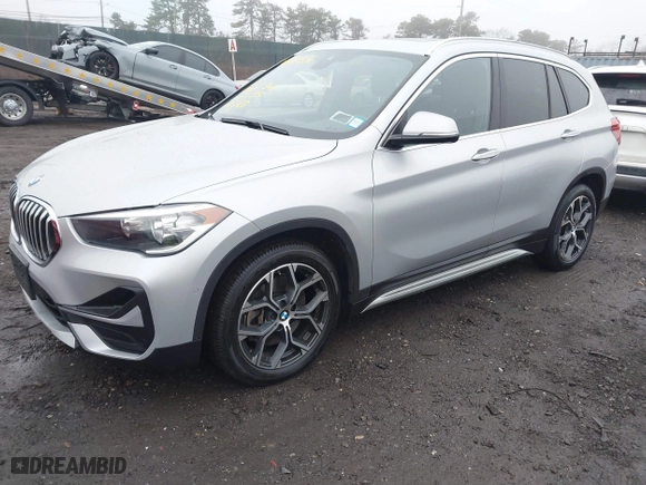 2021 BMW X1 xDrive28i with VIN WBXJG9C04M5T79810, listed as a IAAI auction lot 41471536 with 75,345 mi miles. Bid and sale history available at carsss.com. Image 17.