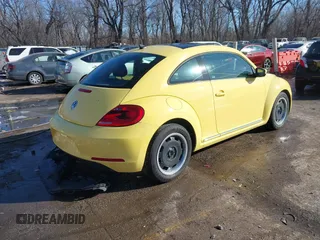 2012 Volkswagen Beetle 2.5L PZEV with VIN 3VWJP7AT9CM610530, listed as a IAAI auction lot 41388728 with 143,909 mi miles. Bid and sale history available at carsss.com. Image 4.