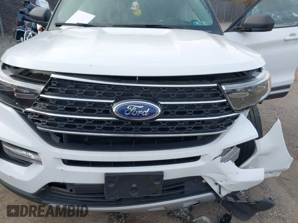 2020 Ford Explorer XLT with VIN 1FMSK8DH2LGC86989, listed as a IAAI auction lot 41078980 with 76,326 mi miles. Bid and sale history available at carsss.com. Image 6.