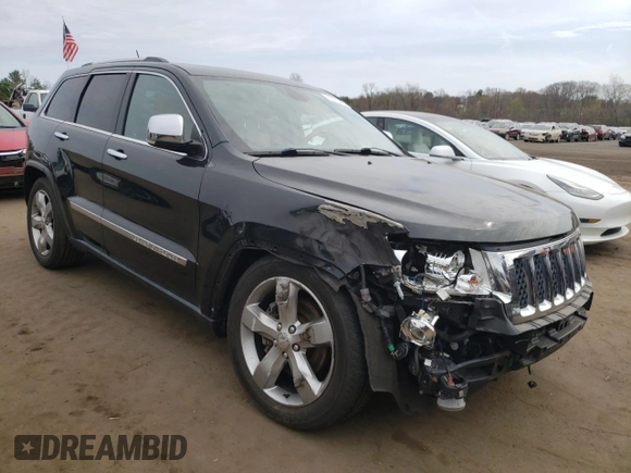 2011 Jeep Grand Cherokee Overland with VIN 1J4RR6GT9BC660730, listed as a Copart auction lot 53770745 with 106,351 mi miles and Salvage title. Bid and sale history available at DreamBid. Image 4.