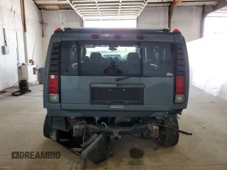 2005 Hummer H2 SUV z VIN 5GRGN23U65H127711, wystawiony jako Copart lot #53180865 z przebiegiem 178 085 mil mil oraz Szkody całkowita. Historia ofert i sprzedaży dostępna na DreamBid. Obrazek 6.